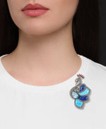 Load image into Gallery viewer, Sterling Silver Tori Hill® Genuine Marcasite Regal Peacock Broach with Brilliant Simulated Blue Topaz and Garnet and Hand Carved Dyed Turquois and Blue Lapis Inlays_I_Heart_1
