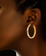 Load image into Gallery viewer, Yellow Gold_Gold Luxe® 14K Yellow Gold Domed Oval Hoop Earrings. Dent Resistant, Infused with Nano Diamond Resin Core® - iHeart Jewels_I_Heart_1