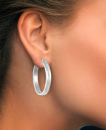 Load image into Gallery viewer, Platinum over Sterling Silver_Diamond Fascination® Diamond Accent Sterling Silver Bold Oval Hoop Earrings - iHeart Jewels_I_Heart_1
