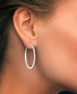 Load image into Gallery viewer, Platinum over Sterling Silver_Diamond Fascination® Diamond Accent Sterling Silver Large Oval Hoop Earrings - iHeart Jewels_I_Heart_2
