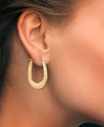 Cargar imagen en el visor de la galería, 14K Yellow Gold over Sterling Silver_Elongated Graduated Twist Oval Hoop Earrings_I_Heart_1
