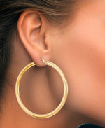 Load image into Gallery viewer, Yellow Gold_Gold Luxe® 14K Gold Large Round Hoop Earrings. Dent Resistant, Infused with Nano Diamond Resin Core® - iHeart Jewels_I_Heart_1
