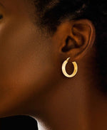 Cargar imagen en el visor de la galería, Yellow Gold_Gold Luxe® 14K Yellow Gold Medium Domed Hoop Earrings. Dent Resistant, Infused with Nano Diamond Resin Core® - iHeart Jewels_I_Heart_1
