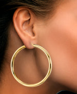 Load image into Gallery viewer, Yellow Gold_Gold Luxe® 14K Gold Large Round Hoop Earrings. Dent Resistant, Infused with Nano Diamond Resin Core® - iHeart Jewels_I_Heart_1
