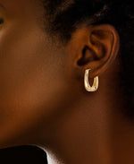 Load image into Gallery viewer, Yellow Gold_Gold Luxe® 14K Yellow Gold Tapered Oval hoop Earrings. Dent Resistant, Infused with Nano Diamond Resin Core® - iHeart Jewels_I_Heart_1
